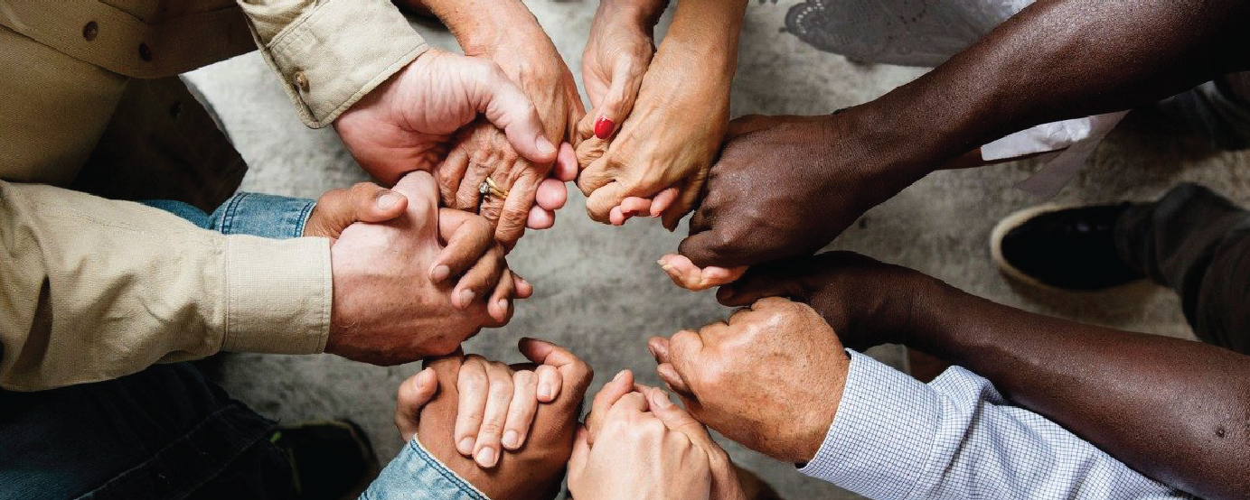 circle of people holding hands