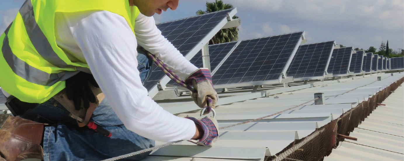 Contractor installing solar panels