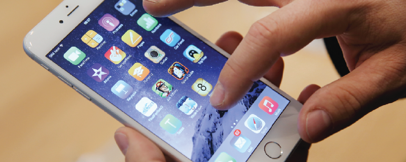 person pressing app on phone