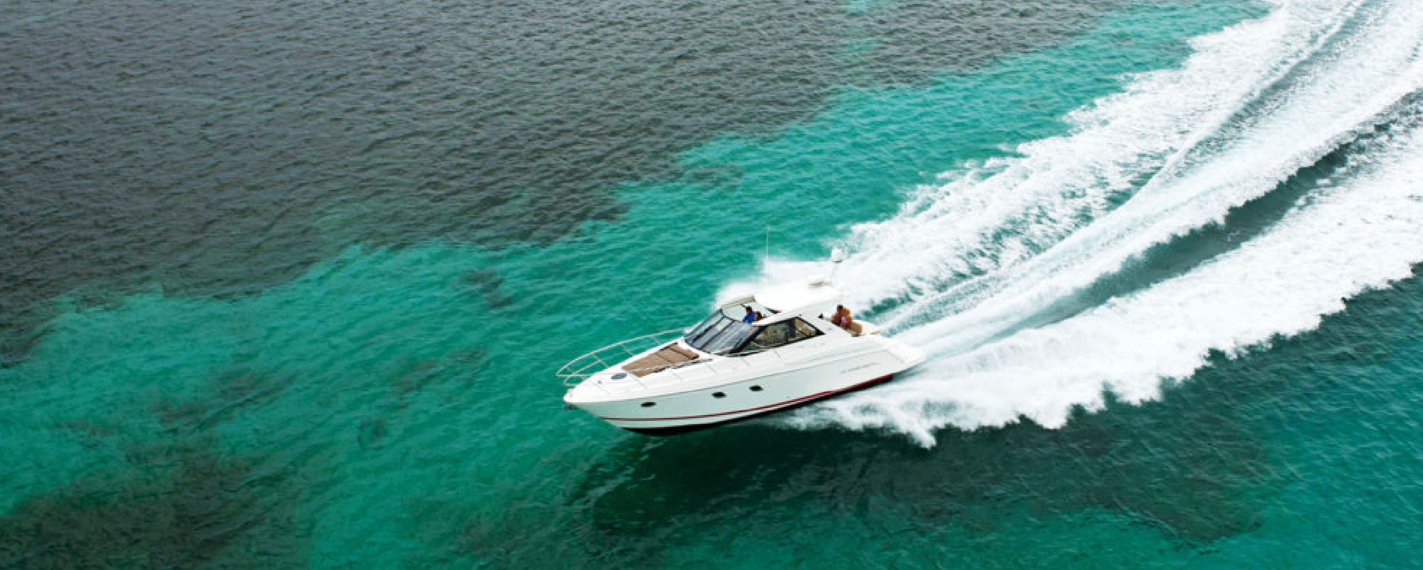 ski boat going fast making waves