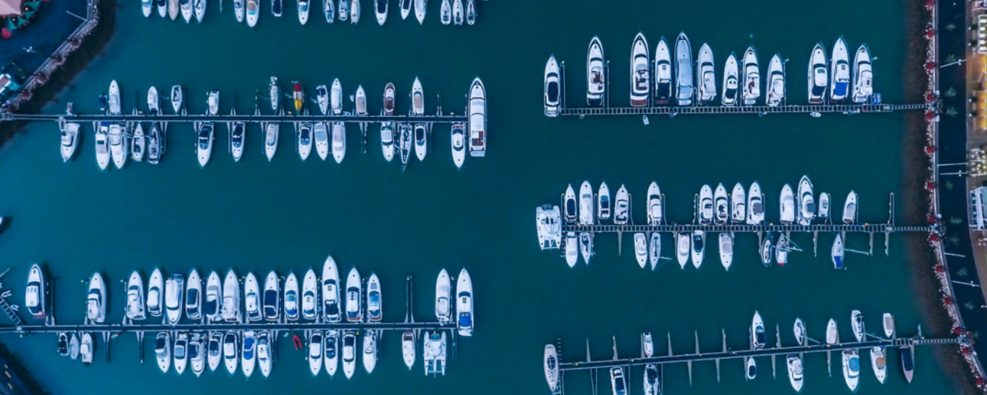 Aerial view of docked boats in marina