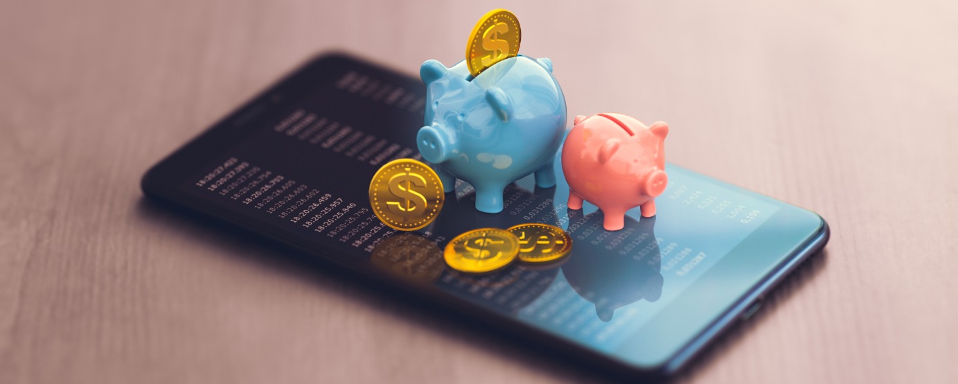 Two piggy banks with coins dropping into one